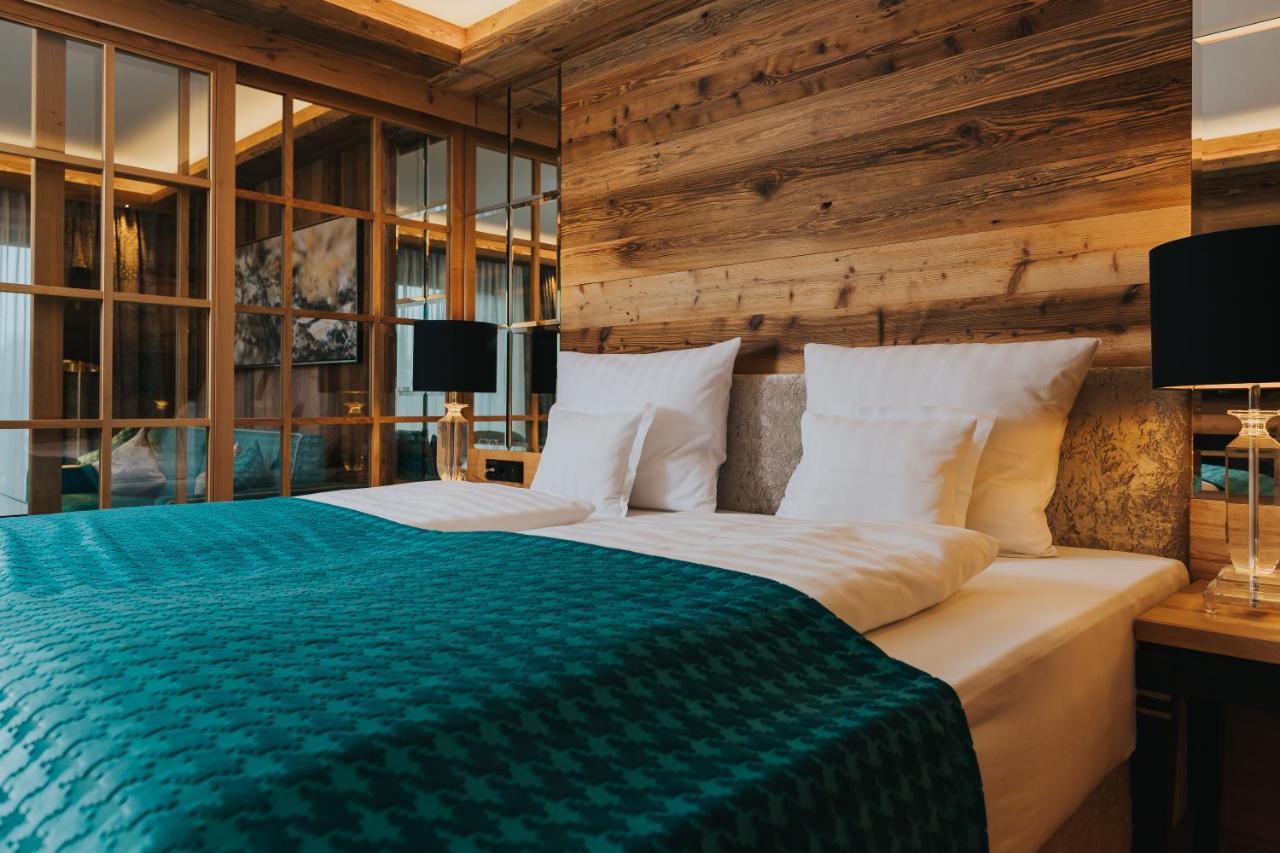 Ortner'S Resort Bad Fussing Luaran gambar A bedroom at the Hotel de la Poste